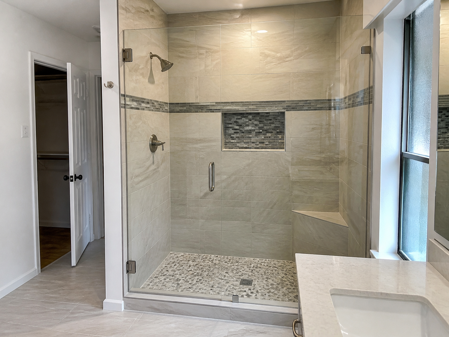 Kitchen remodel with cabinets, countertop, tile, and flooring